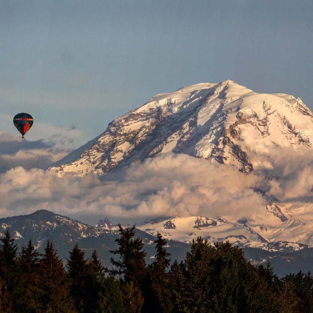 Hot air balloon in front of MT. Rainier from Mercer Iland
