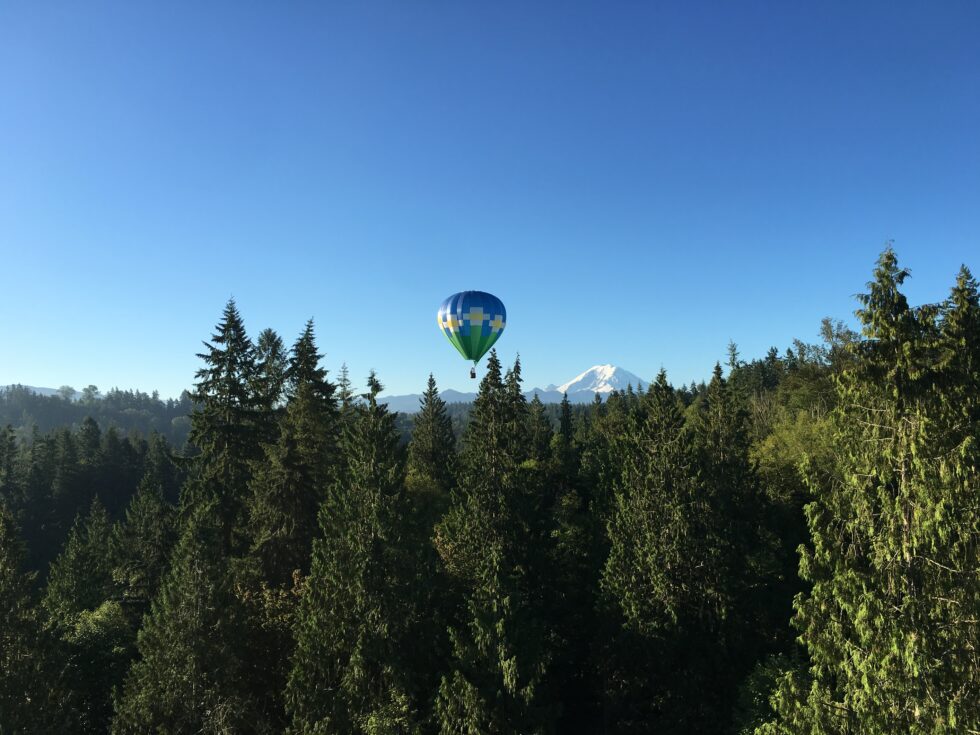 Hot air balloon ride over Green River in Auburn Washington sunrise flight