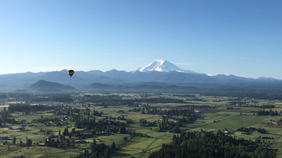 Sunrise hot air balloon flight in Seattle Washington by Mt. Rainier