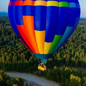 Seattle Ballooning's blue, yellow, orange, and green hot air balloon