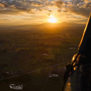 Sun is coming through the clouds at 4800 feet over Enumclaw, WA. The photo was taken from a hot air balloon.
