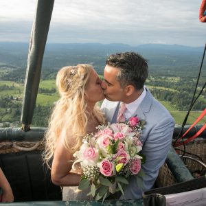 A couple getting married in a hot air balloon 3000 feet above the ground in Seattle, WA